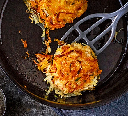 Frying celeriac potato hashbrowns. 