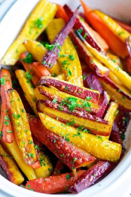 Glazed rainbow carrots plated